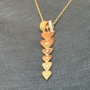 Custom made 14k gold  & 5 diamond key to your heart pendant .